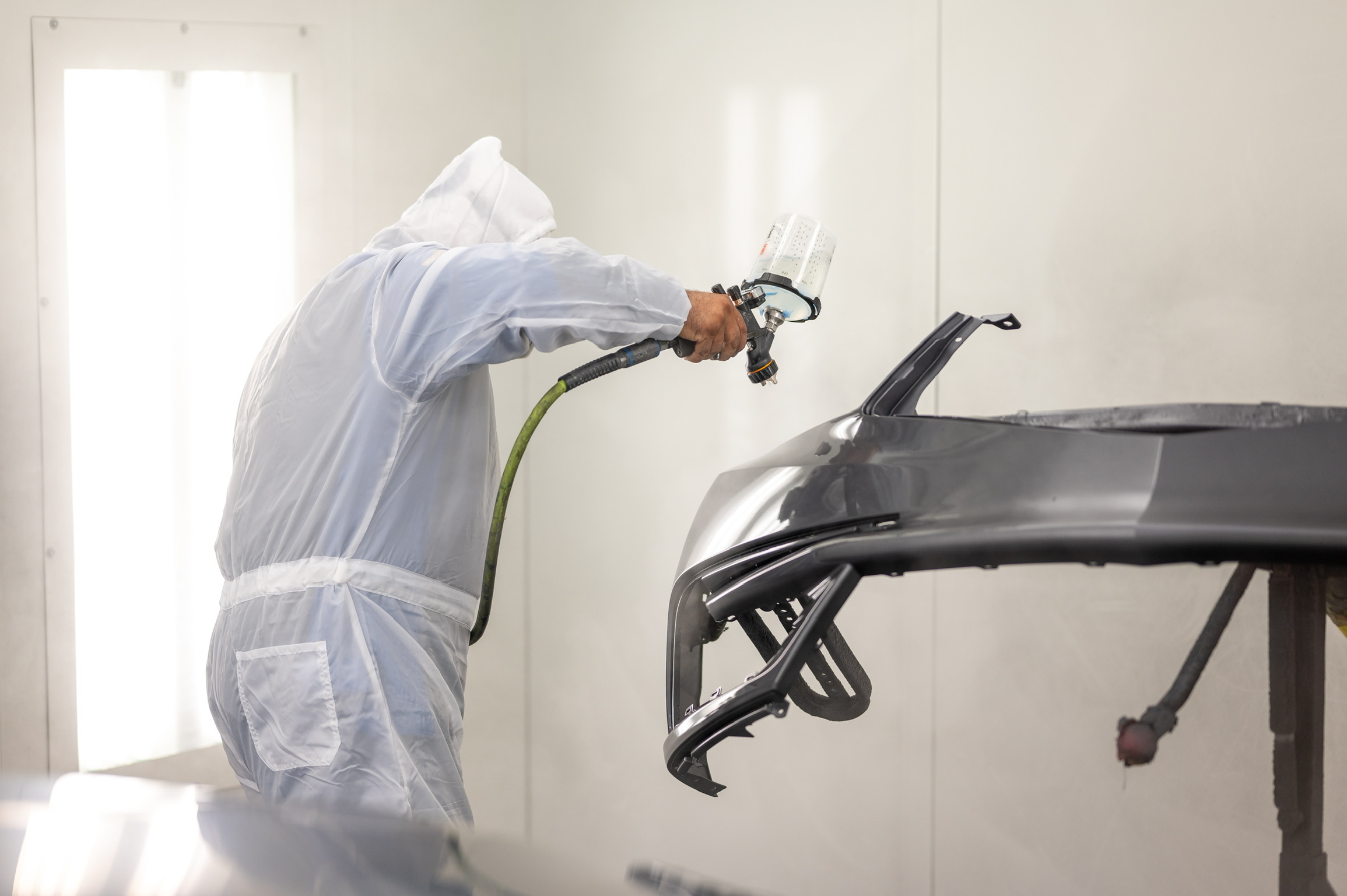 Auto painting and refinishing process at Covina Auto Body.